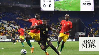 Vinicius and Brazil spot on with black strip anti-racism protest