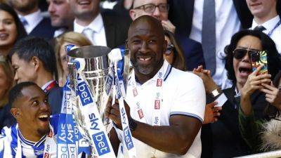 Darren Moore - Sheffield Wednesday - Sheffield Wednesday coach Moore leaves by mutual agreement - channelnewsasia.com - Britain