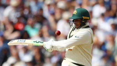 Khawaja puts Australia within 100 runs of beating England on tense final day