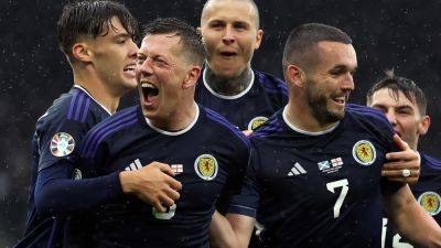 Torrential rain causes long suspension of Scotland’s Euro 2024 qualifier against Georgia