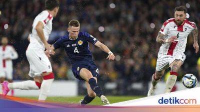 Scott Mactominay - McTominay Dicaci di MU, Dipuja dengan Skotlandia - sport.detik.com - Manchester - Georgia