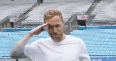 Scott Arfield remembers Rangers roots as transfer unveiling is marked with famous salute celebration