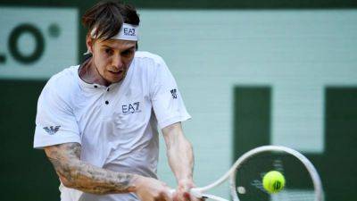 Bublik powers past Rublev to win first grass title in Halle