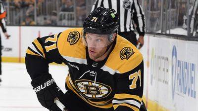 Blackhawks add Taylor Hall in trade with Bruins to upgrade forwards around expected No 1 pick Connor Bedard