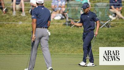 Suh, Matsuyama ride hot putts on steamy day at the Memorial