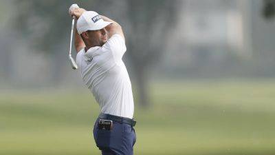 Peter Kuest and Taylor Moore share top spot at Rocket Mortgage Classic in Detroit