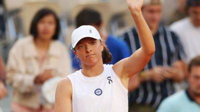 Iga Swiatek into Coco Gauff quarter-final at French Open after Lesia Tsurenko retires