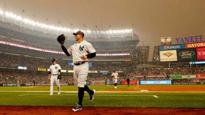 Canadian wildfire smoke surrounds Yankee Stadium as New York issues health advisory over poor air quality