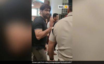 Watch: Fan Asks MS Dhoni About Injured Knee At Airport. Here's How He Reacted - sports.ndtv.com - India