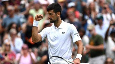 Novak Djokovic: Serbian battles past Hubert Hurkacz to stand just three matches from eighth Wimbledon title
