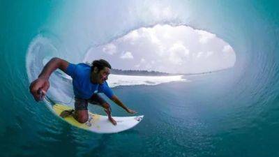 Mikala Jones, surfer who captured action inside waves, dies in surfing accident in Indonesia