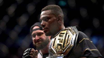 Hill to vacate UFC title after suffering Achilles injury - channelnewsasia.com - Brazil - Usa