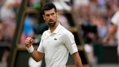 Djokovic closes in on record-tying 8th Wimbledon title after sinking Sinner in semis