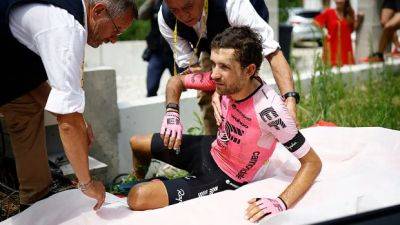 Tour de France leaders Vingegaard, Pogacar avoid injury in mass crash on slippery road