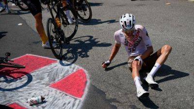 Teams ask fans to behave better after pileup in Tour de France - ESPN