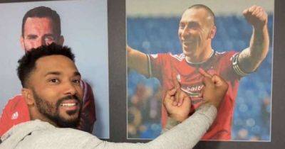 Shay Logan shows Scott Brown the middle finger as Celtic racism row reignited by former Aberdeen star