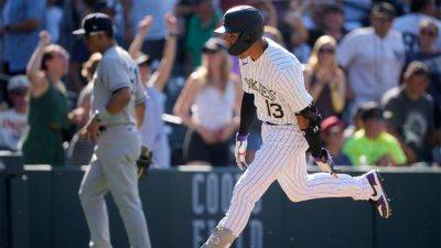 Rockies walk-off Yankees on Alan Trejo's first home run of the season in wild back-and-forth game