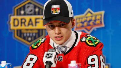 Patrick Kane - Connor Bedard - Top NHL draft pick Connor Bedard signs 1st contract with Chicago on 18th birthday - cbc.ca - Usa - New York - county Canadian