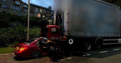 Driver's miracle escape as Mercedes left completely crushed after becoming 'trapped under lorry' in horror crash