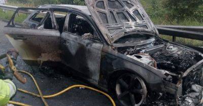 LIVE: M62 traffic delays heading into Manchester after car bursts into flames - updates