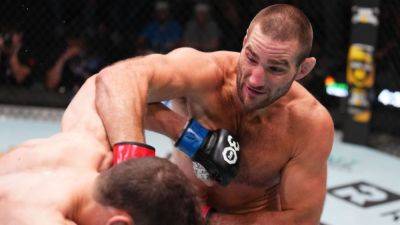 Sean Strickland stops Abus Magomedov in Round 2 in UFC main event - ESPN