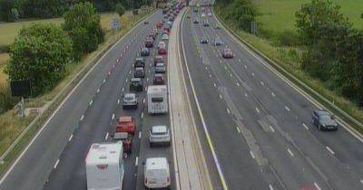 LIVE: 'Vehicle fire' on Manchester motorway with queues building - latest updates