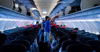 'Anyone going on a Summer holiday should sit in this row on the plane to get upgraded to first class', says flight attendant - manchestereveningnews.co.uk