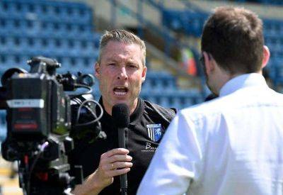 Manager Neil Harris doesn't want to get people too excited as Gillingham look to add final few players to their League 2 squad