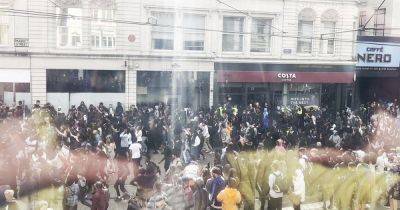 LIVE: Hundreds of teenagers run riot in Manchester city centre on last day of school as eggs hurled at police - manchestereveningnews.co.uk