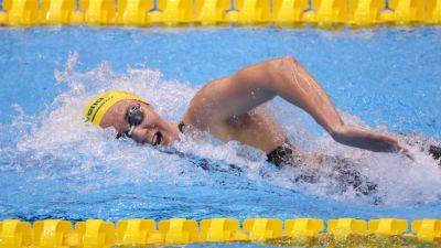 Michael Phelps - Katie Ledecky - Paris Games - Summer Macintosh - Ariarne Titmus wins over Katie Ledecky, sets 400 free record - ESPN - espn.com - Usa - Australia - New Zealand