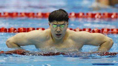 Adam Peaty - Double delight for China as Qin, Zhang strike gold at worlds - channelnewsasia.com - Britain - Portugal - Italy - Usa - Canada - China - Japan