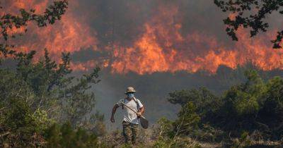 Tourist arriving in Rhodes saw 'everything on fire' then was transferred straight to evacuation centre - manchestereveningnews.co.uk - Greece