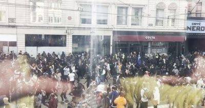 Police vow to leave "no stone unturned" to catch culprits as shocking video shows chaos in St Peter's Square - manchestereveningnews.co.uk