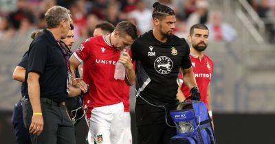 Paul Mullin - Nathan Bishop - Paul Mullin suffers punctured lung following Nathan Bishop collision in Manchester United vs Wrexham friendly - manchestereveningnews.co.uk - Britain