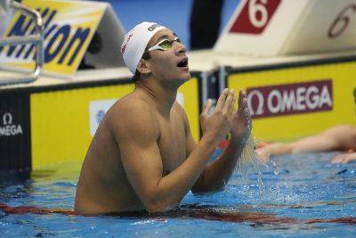 Tunisia's Ahmed Hafnaoui wins men's 800m freestyle swimming world title