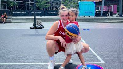 With daughter Poppy by her side, Canada's Crozon chases Olympic basketball dream