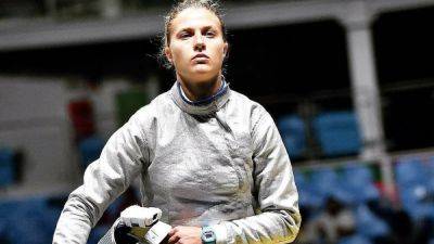 Intl Fencing Federation disqualifies Olha Kharlan for refusing to shake hands with Russian sportswoman