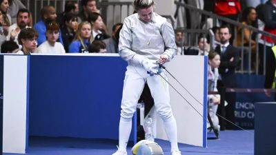 Ukrainian fencer Olga Kharlan disqualified after refusing to shake her opponent's hand