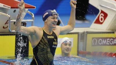 Michael Phelps - Katie Ledecky - Five-star Sjoestroem sets worlds alight, Ledecky and McKeown win - channelnewsasia.com - Usa - Australia - China - Japan