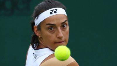 Garcia takes French hopes into Wimbledon second round