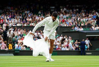 Novak Djokovic and Iga Swiatek ease into Wimbledon second round