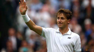 Casper Ruud - Ruud staves off Lokoli to reach Wimbledon second round - channelnewsasia.com - France - Norway