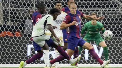 Barcelona And The Woodwork Defeat Real Madrid In Texas 'Clasico'