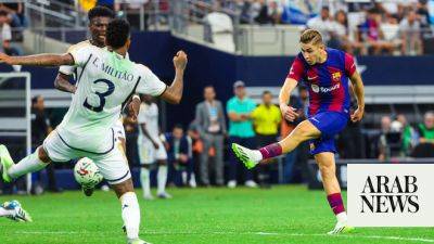Barca – and the woodwork – stop Real Madrid for 3-0 victory in Texas ‘Clasico’