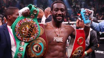 Crawford unifies welterweight division with 9th-round TKO in dominant performance over Spence
