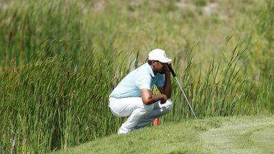 Defending champion Tony Finau lurks in long grass as Lee Hodges seeks wire-to-wire win