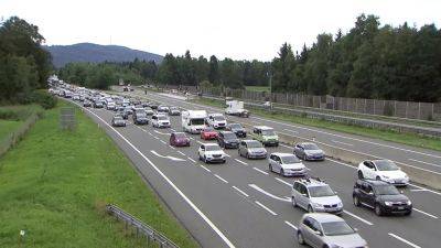 Traffic jams and heatwaves disrupt holidaymakers across Europe