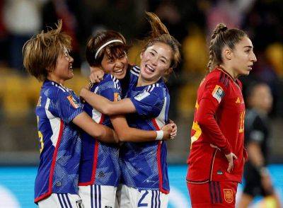 Japan thrash Spain to book place in last 16 of World Cup as Zambia clinch first win