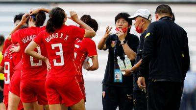 Asian champions China staying grounded ahead of World Cup