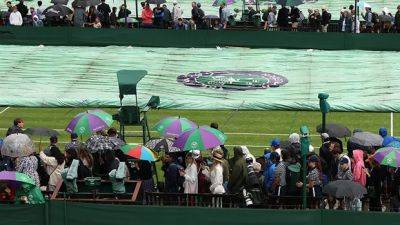 Rain pushes Wimbledon openers for Raonic, Marino, Andreescu to Wednesday